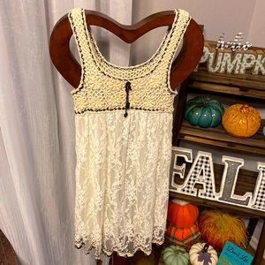 Crochet and lace black and cream dress.